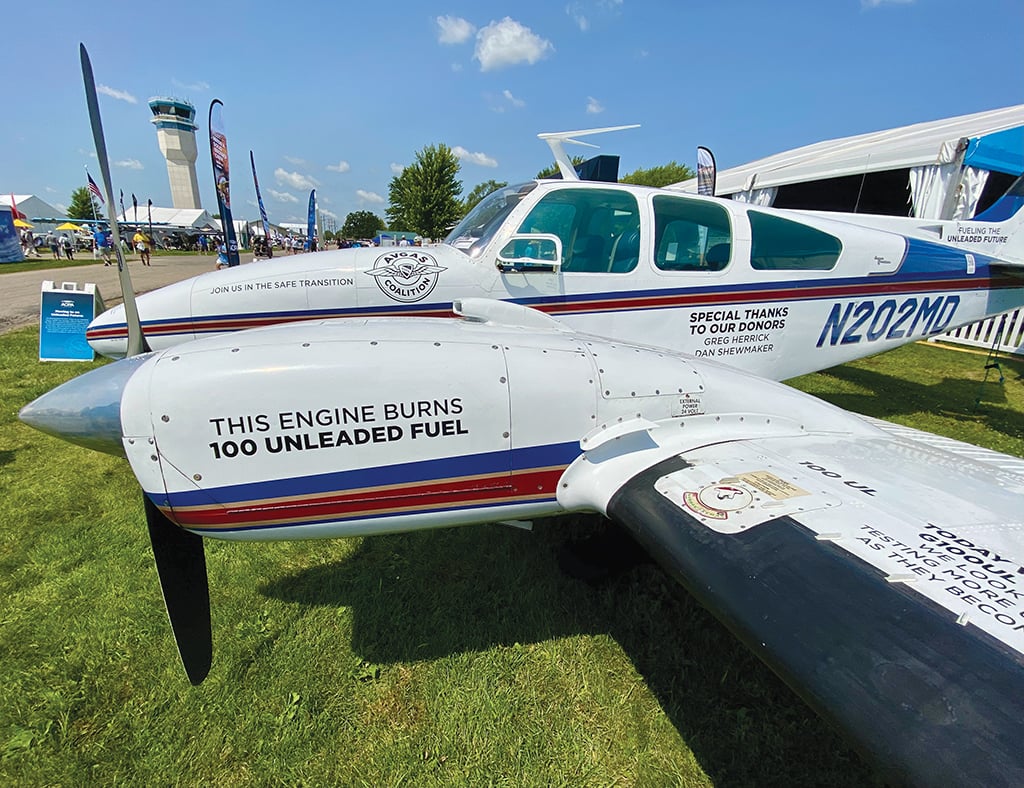 Beechcraft Baron twin piston aircraft on grass