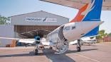 Aircraft in front of hangar