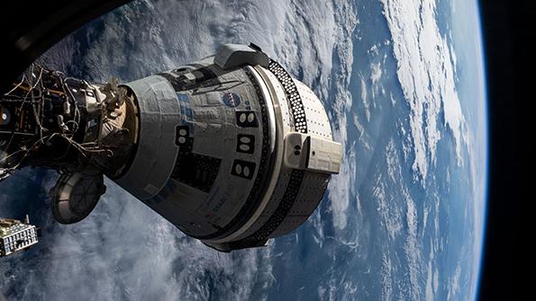 Boeing Starliner in orbit over Earth